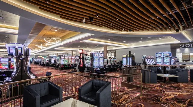 Lounge chairs above the ACE Airport gaming floor